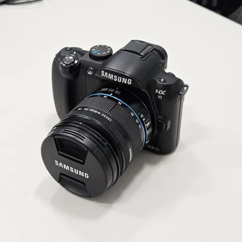 Câmera Samsung NX10 + lente 18-55mm + Acessórios - nx 10 Sony nex Mirrorless