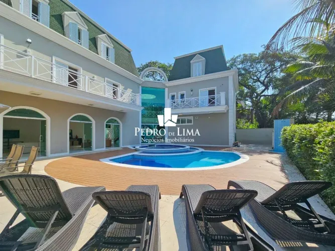 Casa com 5 dormitórios à venda, 569 m² por R$ 8.000.000,00 - Riviera Módulo 21 - Bertioga/
