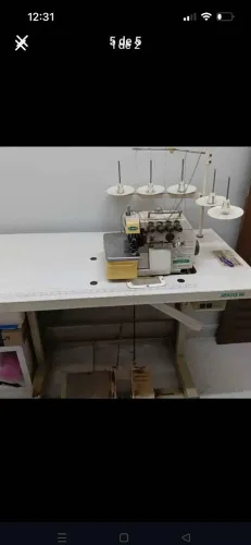 Maquina de costura Interlock Zoje