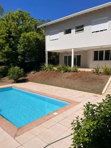 Casa com 4 dormitórios à venda, 595 m² por R$ 3.300.000,00 - Residencial Parque Rio das Pe