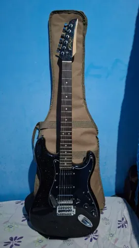 Guitarra Seize com pedal pocket amp