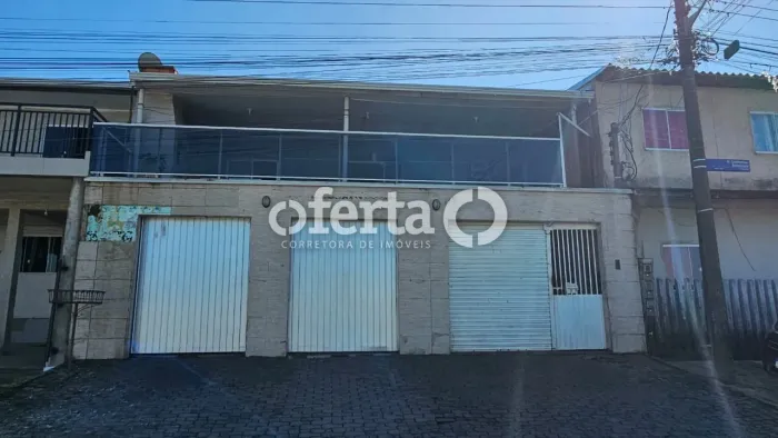 Casa com sala comercial no Tatuquara, em Curitiba
