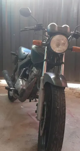 Fan 125 com a frente da mix 150 freio a disco rodas de liga manutenção em dia 