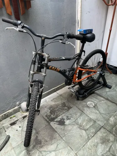 Bicicleta 26 Caloi Xrt Full 21v Preta Laranja