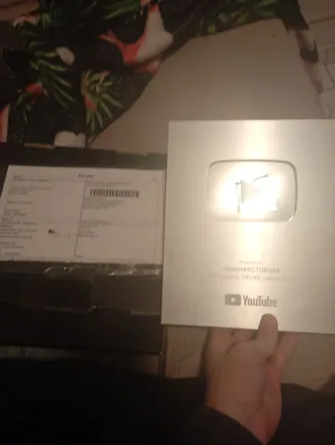 Placa de 100k do meu canal do YouTube original