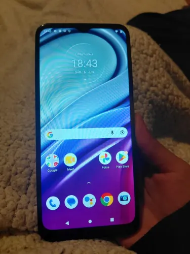 Motorola Moto G20, com marcas de uso.
