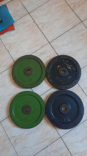4 anilhas 10Kg e Barra olímpica 1,8 m