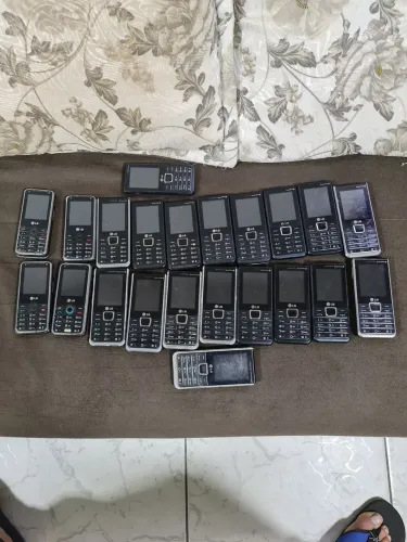 Celular antigo gx200 e a 395