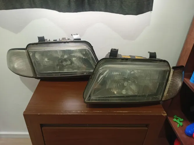 Par de farol audi a4 com pisca, originais em excelente estado