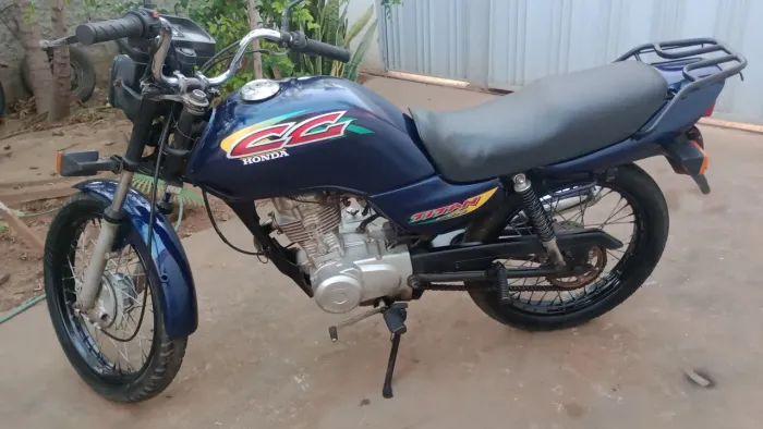 vende se  tintan 125 muito bem conservada  em dias