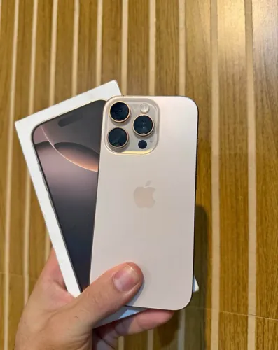 iphone 16 pro dourado 128gb , super novo estado de zero sem marcas de uso zero zero 