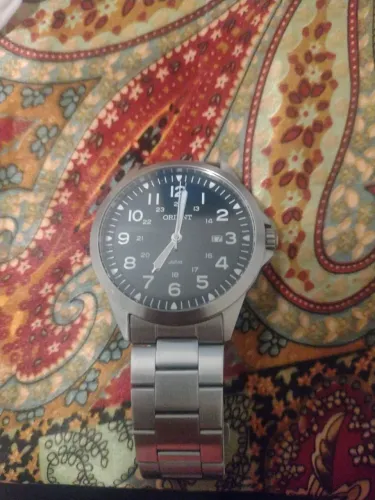 Relógio oriente original Novo vai com a caixa