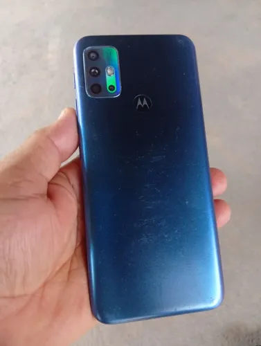 Celular Motorola com a bateria tufada 