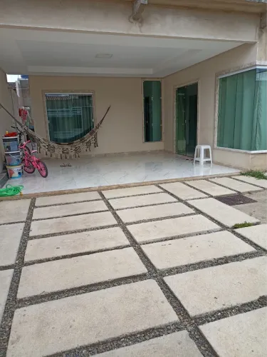 Casa de prédio, troco em carro