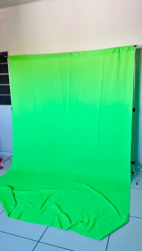 Fundo fotográfico com tecido verde 