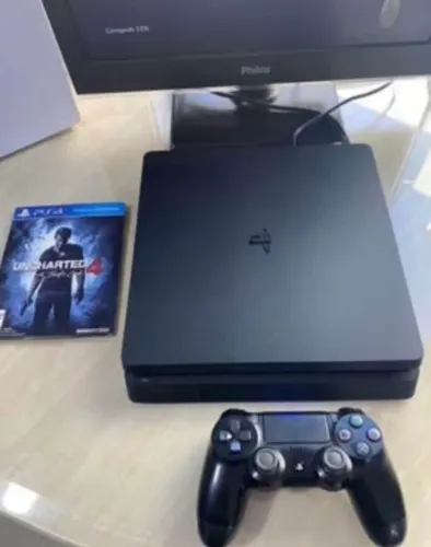 Ps4 Slim 1 Tera 2 controles 1 Jogo e Cabos..