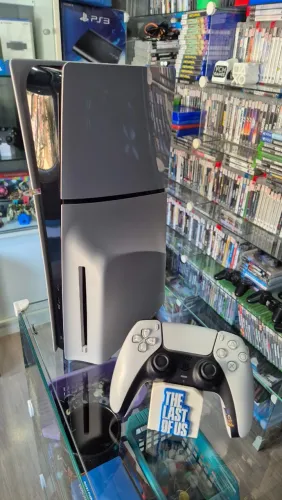 PS5 Slim, Seminovo, Garantia, aceito seu usado de entrada e cartoes ate 18x