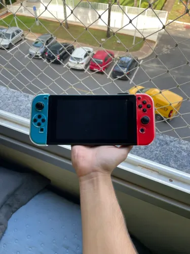 Nintendo Switch V2 c/ Super Smash Bros