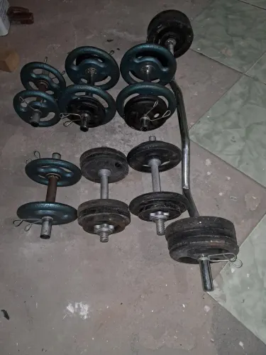 Anilhas e barras para treino 