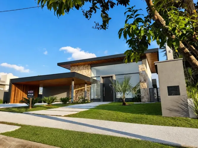 Casa de condomínio para venda tem 370 metros quadrados com 4 quartos