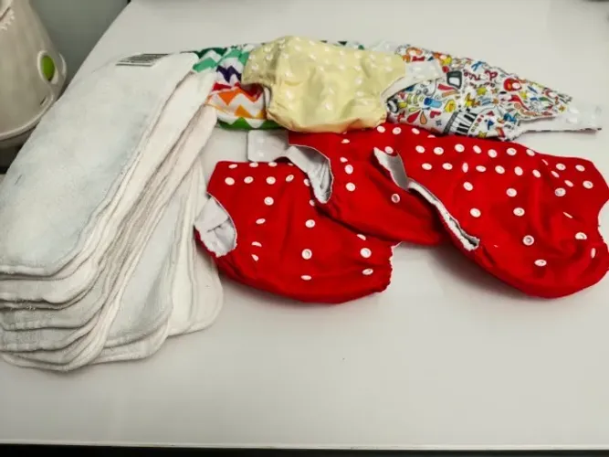 Kit com 6 fraldas ecológicas huggies