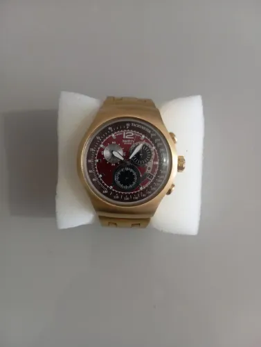 Relógio Swatch série ouro