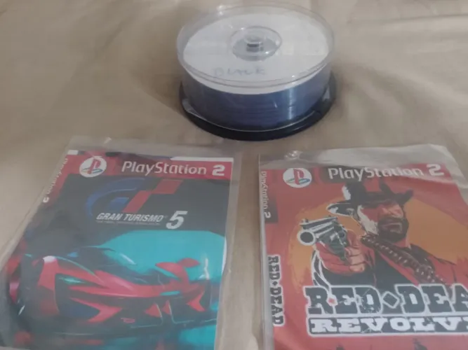 Jogos ps2 + porta DVD
