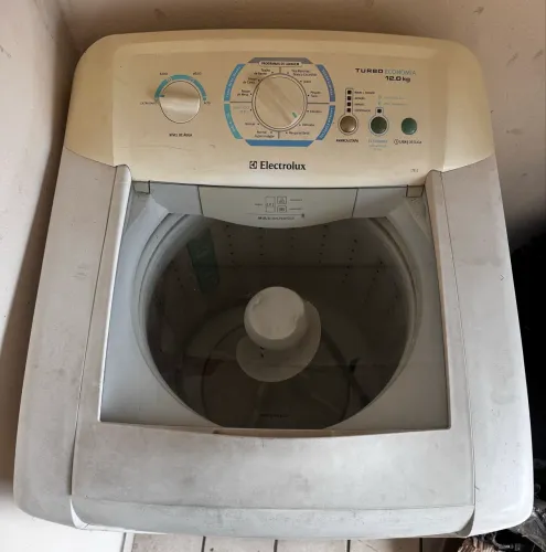 Máquina de lavar com defeito 