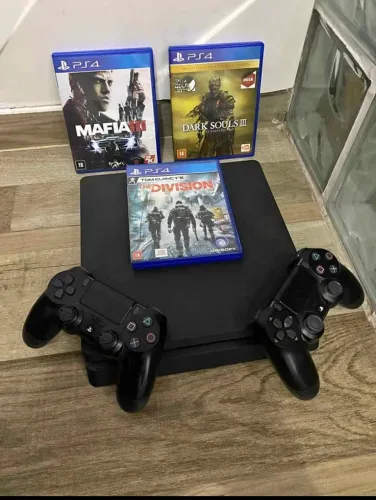Playstation 4 slim,1 tb,2 manetes,1 jogo,entrego em casa e aceito cartao !!