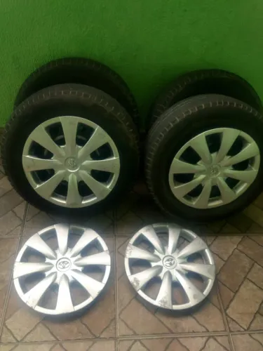 Jogo roda aro 15 original Corolla 5 furo pneu meia vida *