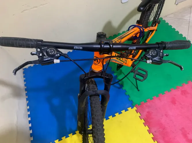 Bicicleta Absolute Nero laranja pouco usada, está em perfeito estado.