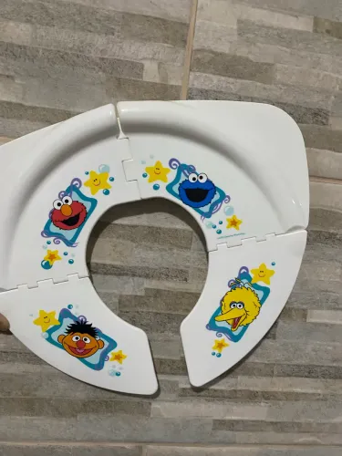 Assento portátil para os pequenos tema vil sessamo