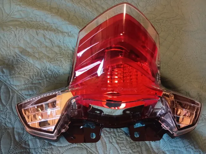Vendo lanterna  moto biz 