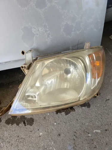 PAR DE FAROIS ORIGINAL HILUX 2005