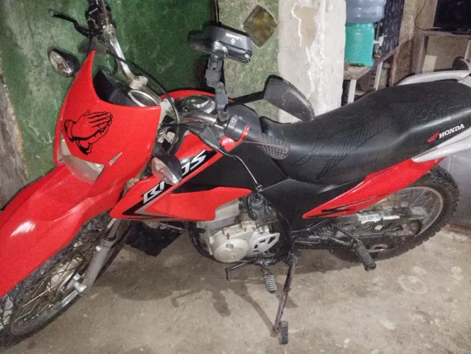A moto é muito alta quero vender para comprar uma menor