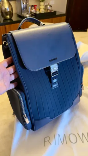 Mochila rimowa azul marinho nova acompanha dust bag