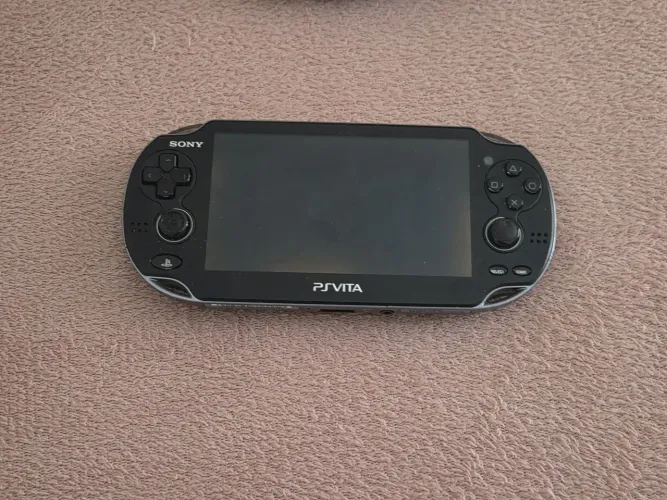  PS Vita OLED Desbloqueado + Gravity Rush + NFS + 3 Jogos + Case Completo