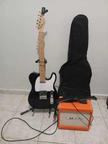 Guitarra e produtos da foto
