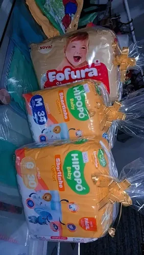 Pacote de fralda shortinho M e G acompanha o lenço umedecido