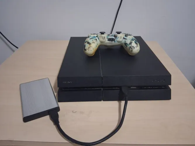 PS4 FAT + HD de 1 TB