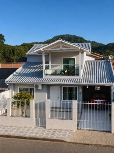 Casa com 4 dormitórios à venda, 174 m² por R$ 850.000,00 - São Sebastião - Palhoça/SC