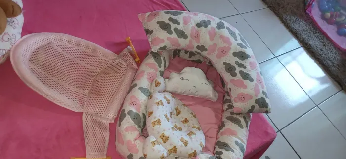 Ninho bebê com rede banho