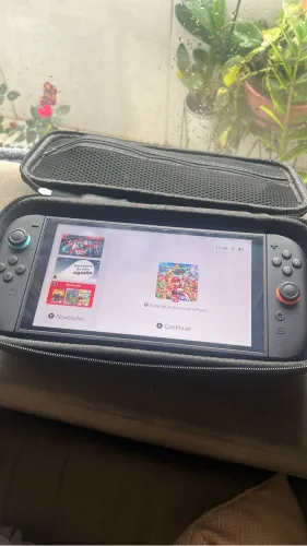 Nintendo Switch 2 novíssimo, com jogo Mario kart ja na memória e nota fiscal! Completo.