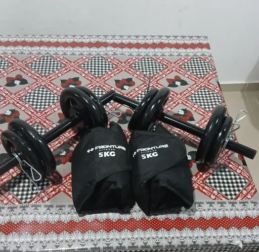 VENDO 2 HALTERES AJUSTAVEIS E 2 CANELEIRAS