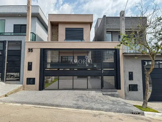 CASA EM CONDOMÍNIO COM 3 SUÍTES PISCINA E 2 VAGAS EM SANTANA DE PARNAÍBA