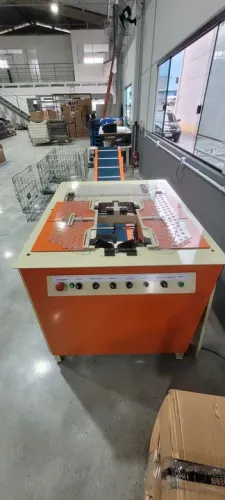 Vendo maquina de dobrar e embalar camisas 