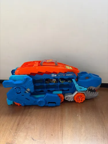 Caminhão Transportador T-Rex Ultimate da linha Hot Wheels City (modelo HNG50)