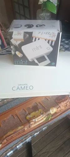Máquina de imprimir silhouete camelo.