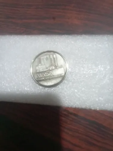Ficha comemorativa da NASA