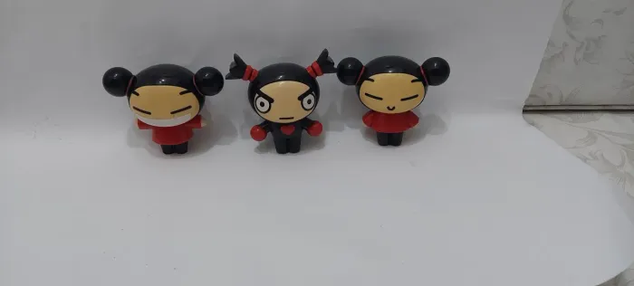 Bonecos Colecionáveis da Pucca e do Garu.